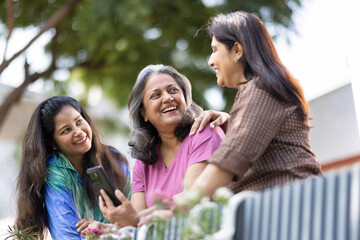 Happy Indian senior women having fun together outdoor