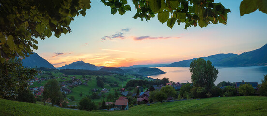 view over spa town Krattigen, lake Thunersee, in the evening