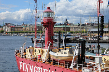 old and historical boat in the port of Stockholm - obrazy, fototapety, plakaty