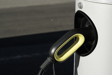 Rome, Italy - February 18, 2023, detail of a coupling for charging the battery of an electric car.