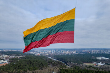 Aerial winter view of huge Lithuanian flag, Independence Day, Vilnius TV Tower, Lithuania