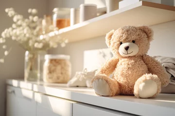 Fotobehang a teddy bear on a shelf © Violeta