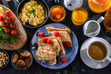 Breakfast served with coffee, eggs, cereals nd croissants