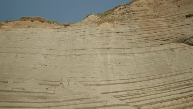 Huge Rocky Cliff At Logas Beach In Peroulades