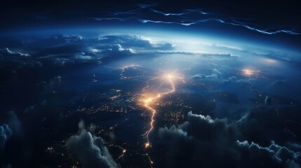 Aerial view of bright lightning strike onto ground in a thunderstorm at night.