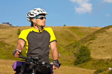 Mountain biker in Dolomites mountains. Travel, sport. active lifestyle concept