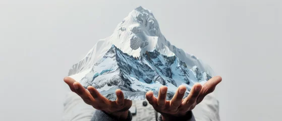 Photo sur Plexiglas Mont Cradle Allegory of Environmental Care with Hands Holding a Snowy Mountain