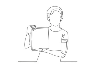 A child is showing his book