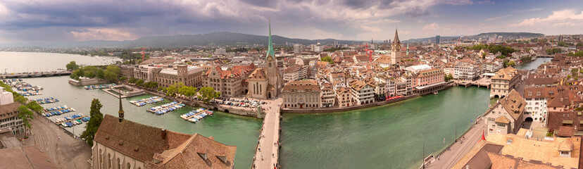 Aerial panorama of Zurich Old town with famous Fraumunster, St Peter churches and river Limmat from...