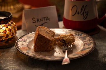 coffee cake on a plate with mug of hot chocolate waiting for santa