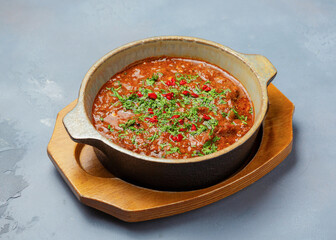Georgian dish Chkmeruli in a plate.