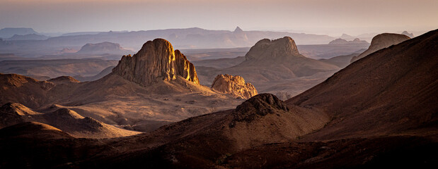 Hoggar landscape in the Sahara desert, Algeria. A view of the mountains and basalt organs that...