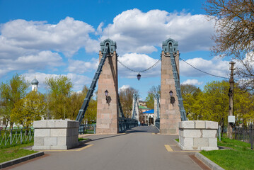 Suspension bridge over the Velikaya River. The city of Ostrov, Pskov region. Russia