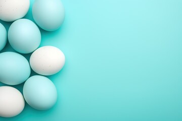 Beautiful painted Easter eggs on a pastel turquoise background. Modern Easter eggs are painted with natural mint, turquoise, pink dye.