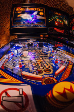 Krakow, Poland - November 17, 2023: "Space Shuttle" pinball machine in an underground bar