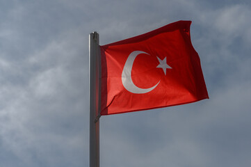 Turkish flag against the sky on a sunny winter day 10