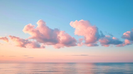 pink clouds over a body of water