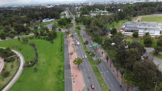 Drone shot of vehicle avenue connected to a roundpoint, Bogota city, Colombia, Latin America
