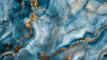 close-up of a marble with gold splashes, blue  background