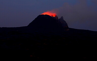 Erta Ale is a chain of volcanoes located in the Afar Triangle, Ethiopia. Here the Earth is...