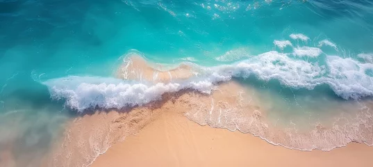 Poster Aerial view of ocean waves, blue water, foam, white sandy beach  summer seascape from above © Ilja