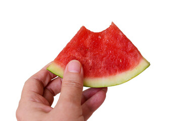 hand holding a slice of watermelon