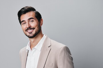 suit man beard business smiling copyspace businessman handsome beige portrait happy
