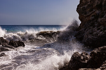 Waves breaking over rocks in Sicily - 738922130