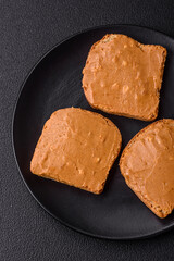 Delicious hearty sandwich with toast bread and peanut butter