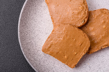 Delicious hearty sandwich with toast bread and peanut butter