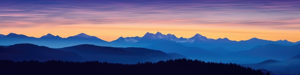 Silhouette of Cascade Mountain Range against a Blue Background during Blue Hour after Sunset.
