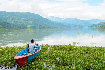 views of phewa lake in pokhara, nepal