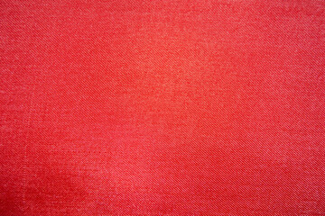 Red fabric. Texture of a red piece of fabric. Red fabric