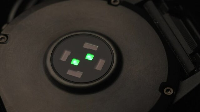 Close-up of optical heart rate sensor flashing green light