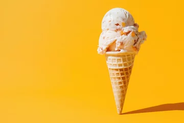 Foto auf Alu-Dibond Soft Serve Ice Creams cone with a scoop of ice cream on a yellow background © Anna