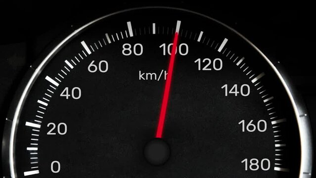 Car Speedometer Needle hitting One Hundred and Twenty Kilometer Per Hour, 4K Footage. Car speeding concept backdrop