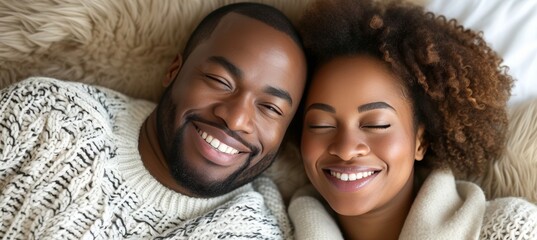 Blissful african american couple in white clothes sleeping on white bed with copy space - Powered by Adobe