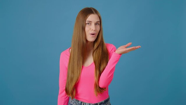 Caucasian emotional young curly haired woman in casual clothes, showing tasty gesture