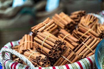 Bundles of cinnamon sticks in a bag at a bazaar in Acre, Israel