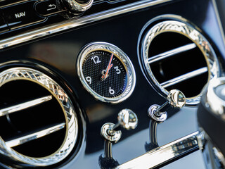 luxury mechanical watches in a premium expensive car