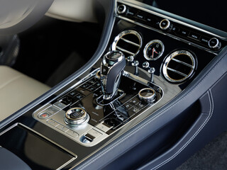 control panel for driving mode settings in a luxury coupe car