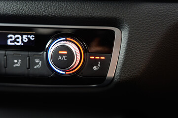 Heated seat and AC button