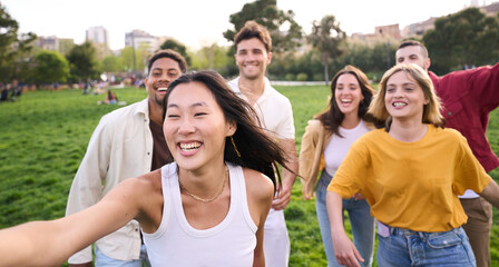 Selfie of a happy group of students having fun. Confident millennial friends gathering. Young...