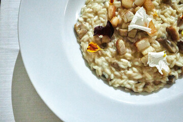 Risotto in a white dish.
