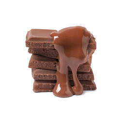Pieces of milk chocolate with tasty paste isolated on white
