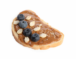 Toast with tasty nut butter, blueberries and peanuts isolated on white