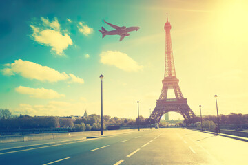 Airplane landing in Paris above Eiffel tower, France, travel Europe