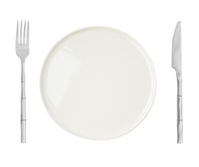 Clean plate, fork and knife on white background, top view