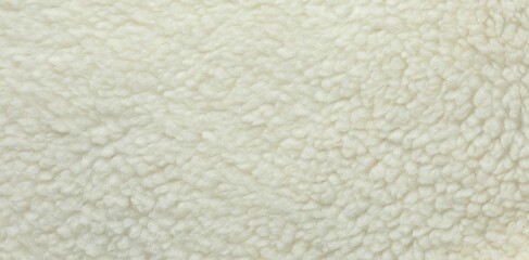 Texture of white fleece fabric as background, top view © New Africa