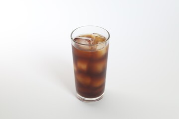 Iced coffee in glass on white background